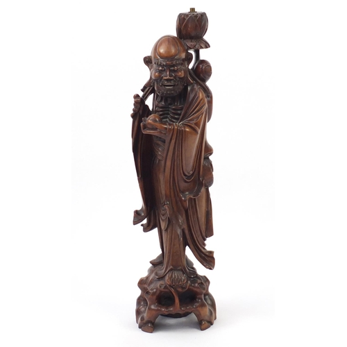 2387 - Large Chinese root carved lamp base, in the form of an elder, 73cm high