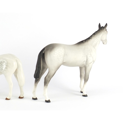 2483 - Two Beswick matt grey horses and a Connemara dapple grey example, the largest 20cm high
