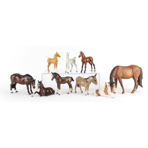 2487 - Seven Beswick horses and foals together with two Royal Doulton, the largest 15cm high