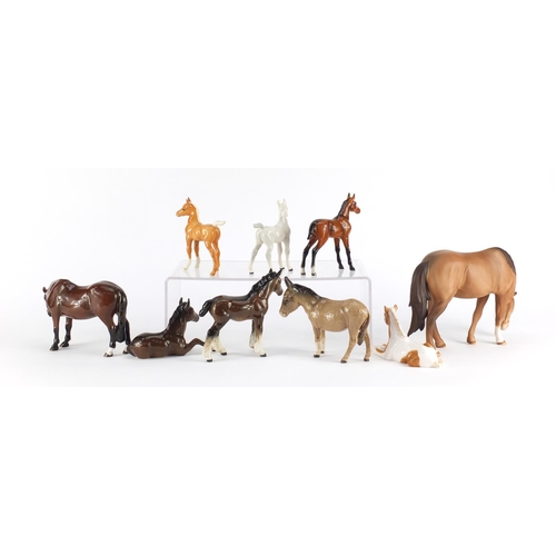 2487 - Seven Beswick horses and foals together with two Royal Doulton, the largest 15cm high
