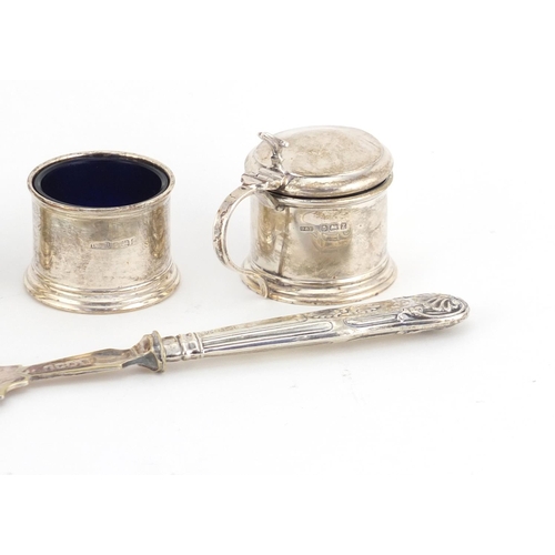 2595 - Silver three piece cruet and a fish slice with silver handle, the cruet with blue glass liners, 174.... 