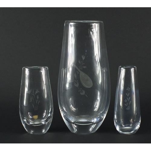 2381 - Three Orrefors glass vases including a large example etched with a mandolin, one with paper label, t... 