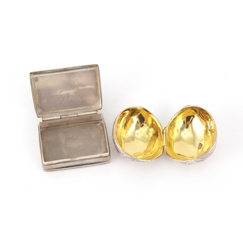 2581 - Two silver pill boxes, one in the form of a walnut with gilt interior, the largest 3.8cm in length, ... 