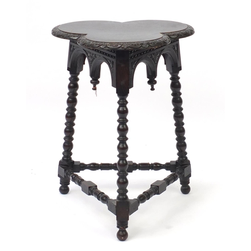 2065 - Carved oak club top occasional table with bobbin turned legs, 72cm H x 54cm W x 54cm D
