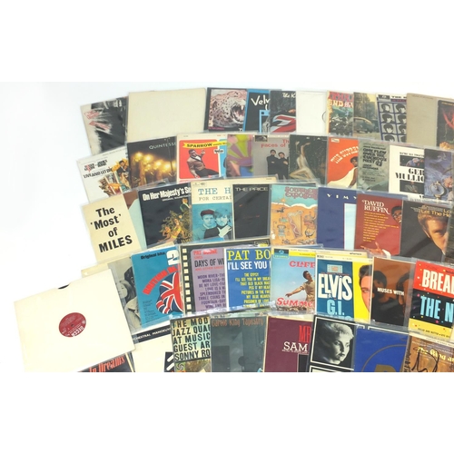 2128 - Vinyl LP's and programmes including The Beatles White album, The Rolling Stones Sticky Fingers with ... 