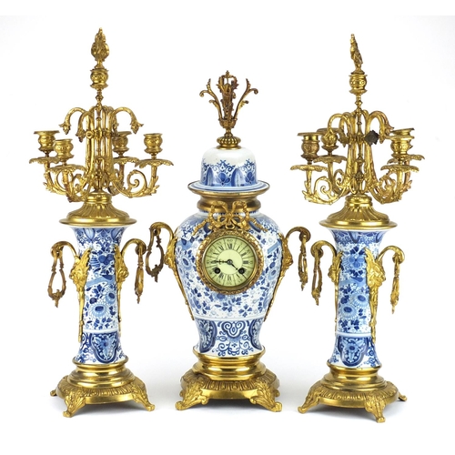 2234 - Chinese blue and white porcelain three piece clock garniture with gilt metal mounts, each hand paint... 