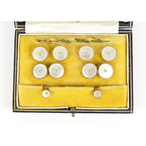 2658 - Set of 9ct gold and mother of pearl cufflinks, studs and buttons, housed in a Mappin & Webb fitted c... 