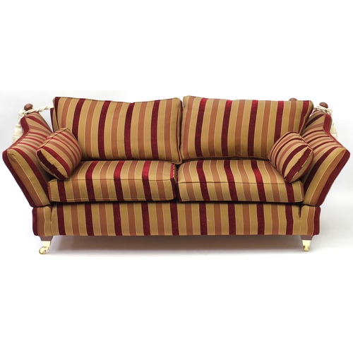 2017 - Knoll drop end three seater settee with red and gold upholstery, 230cm in Length