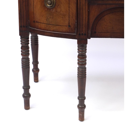 2035 - Regency mahogany six legged sideboard with line inlay, two central doors and two drawers, one with w... 