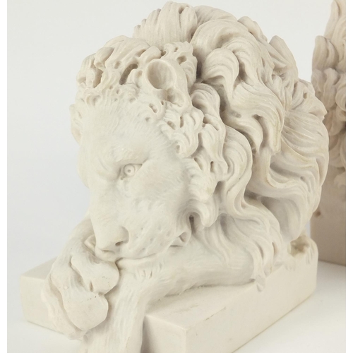 2209 - Pair of Grand Tour style lion design bookends, the largest 14cm high