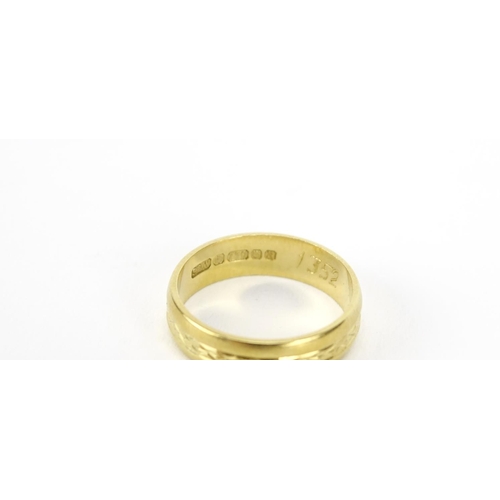 2906 - 18ct gold wedding band with engraved decoration, size J, 3.0g