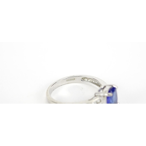 2897 - 18ct white gold blue stone and diamond ring, size N, 3.5g