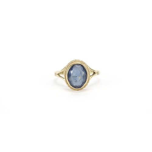 2920 - 9ct gold blue stone solitaire ring, size N, 2.7g