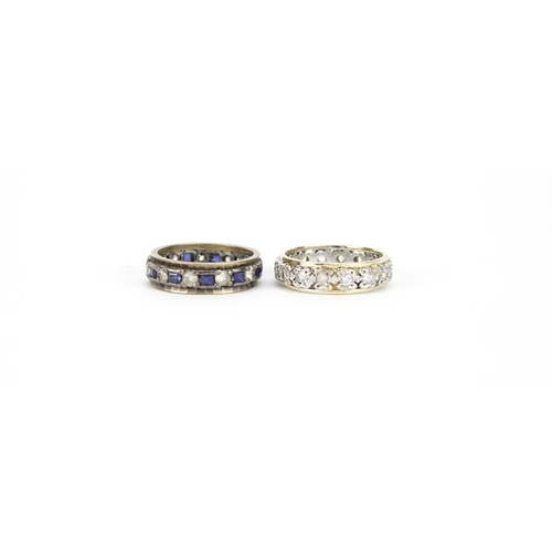 2853 - Two 9ct gold eternity rings set with blue and clear stones, sizes L and M, 7.5g