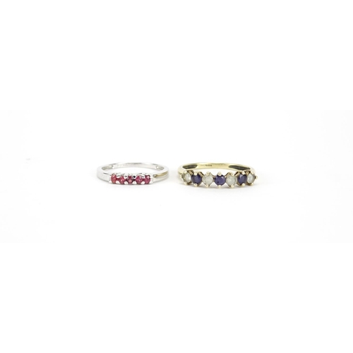2863 - 9ct white gold orange stone ring, size N and a 9ct gold purple and clear stone ring, size R, 3.4g