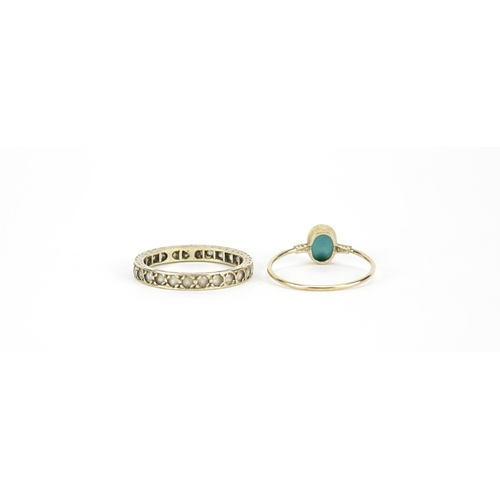 2696 - 9ct gold clear stone eternity ring and a 9ct gold cabochon turquoise ring, sizes P and M, 3.3g