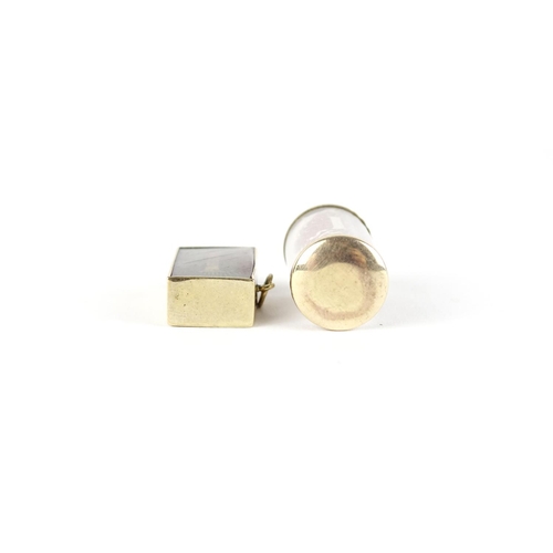 2749 - Two 9ct gold emergency note charms, the largest 2.5cm high, 6.3g