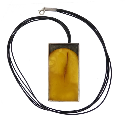 2948 - Designer sterling silver and butterscotch amber necklace by Mariusz Gliwinski, the pendant 6.5cm in ... 