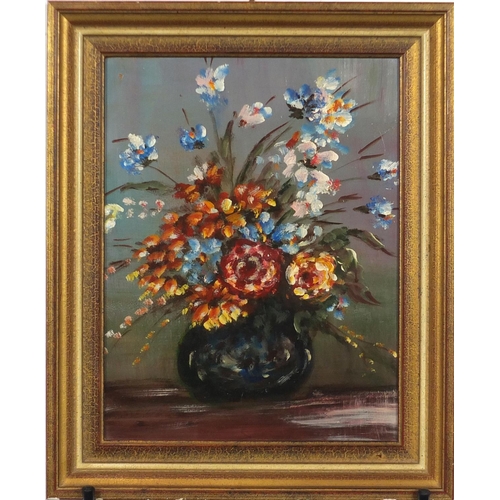 2474 - Still life flowers in a vase, oil on board, bearing an indistinct inscriptions verso, mounted and fr... 