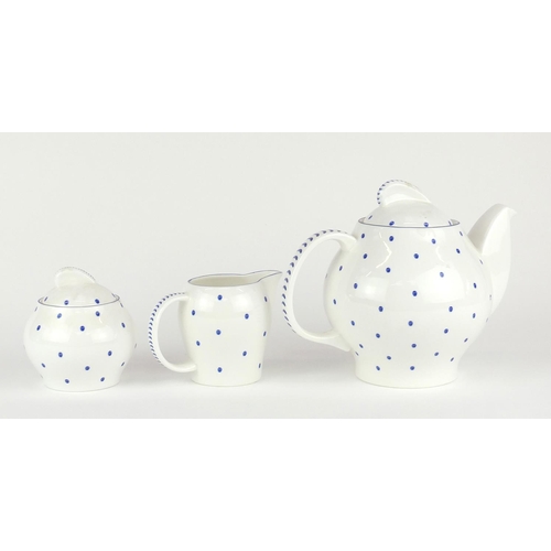 2257 - Wedgwood Susie Cooper design polka dot teapot, milk jug and sugar bowl, the teapot 18cm high