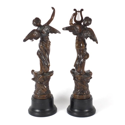 78 - Pair of French bronzed Spelter winged figures - La Musique and La Danse, 45cm high