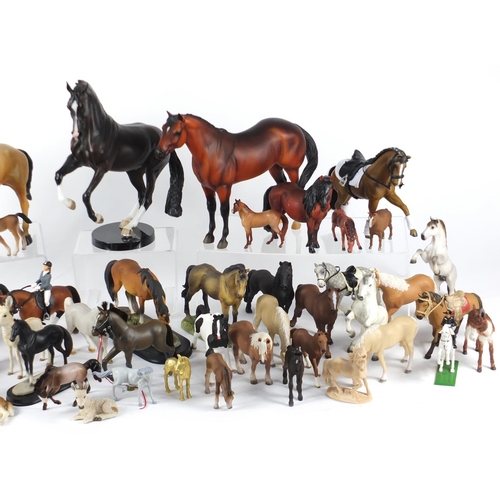 172 - Collection of model horses, the largest 26cm high