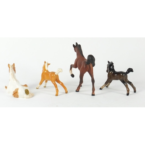 92 - Four Beswick china horses, the largest 12cm high