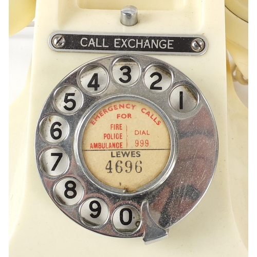 147 - Two vintage cream Bakelite dial telephones