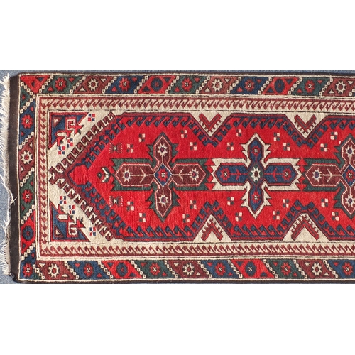 2079 - Rectangular carpet runner having an all over geometric motifs, 280cm x 79cm