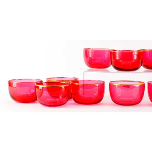 2359 - Set of twelve Victorian cranberry glass finger bowls with gilt rims, 12cm in diameter