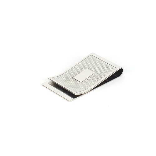 2570 - Alfred Dunhill silver money clip, 5cm in length, 20.9g