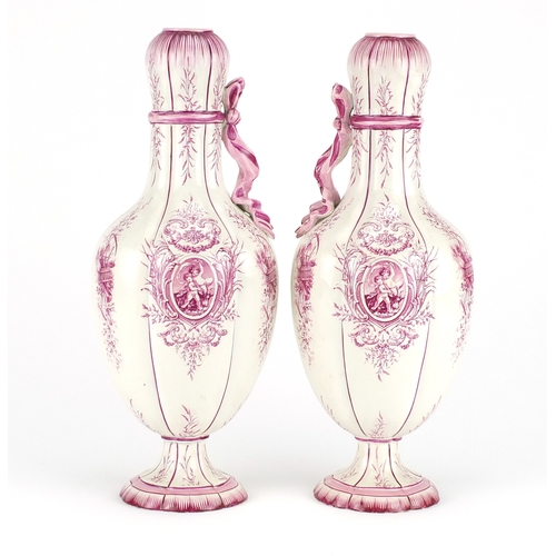 2331 - Pair of French pottery vases with ribbon design handles by Gien, each decorated with a panel of putt... 