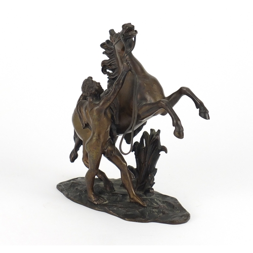 2319 - After Coustou 19th century bronze study of a Marley horse and trainer, signed to the base, 20cm high