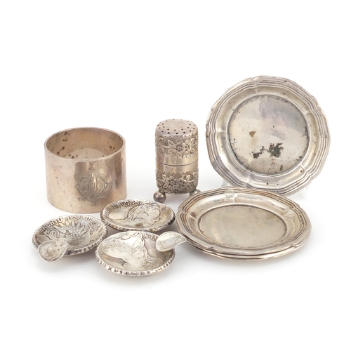 2601 - Silver objects comprising napkin ring, miniature caster, five dishes and a Maria Theresa Thaler ash ... 