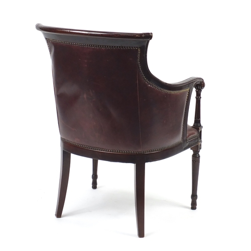 2078 - Mahogany and brown leather library chair on tapering legs, 91cm high