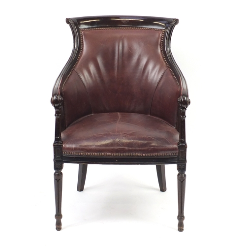 2040 - Mahogany and brown leather library chair on tapering legs, 91cm high