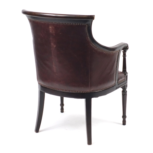 2040 - Mahogany and brown leather library chair on tapering legs, 91cm high