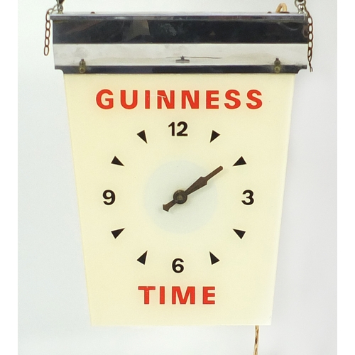 2489 - Vintage chrome and glass Guinness Time advertising clock, 44cm high