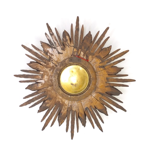 2057 - Vintage gilt wood sunburst design wall clock, with silvered dial and Arabic numerals, impressed '26'... 