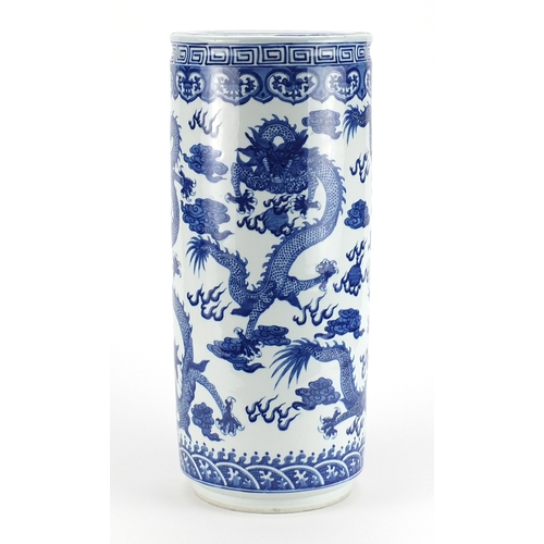2105 - Chinese blue and white porcelain stick stand, hand painted with dragons chasing a flaming pearl amon... 