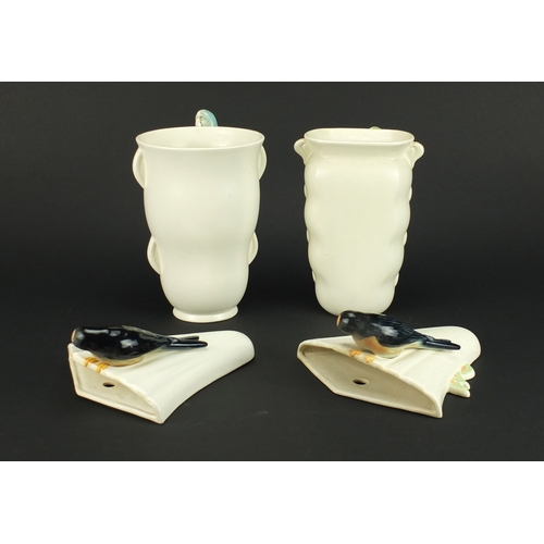 2407 - Two Art Deco Sylvac/Falcon Ware vases and a pair of wall pockets, mounted with budgies and swallows,... 