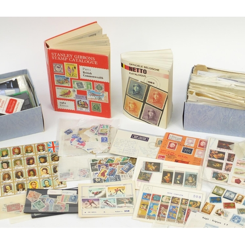 489 - Large collection of loose World stamps and stamp guides