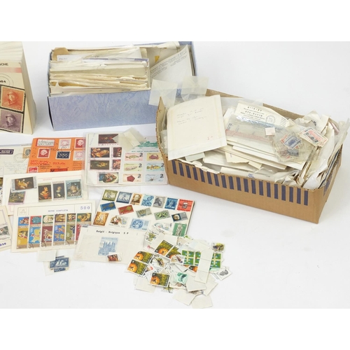 489 - Large collection of loose World stamps and stamp guides