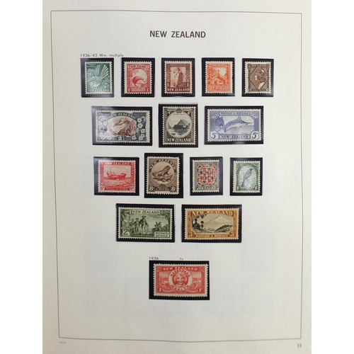 496 - New Zealand and Belgium stamps arranged in two albums