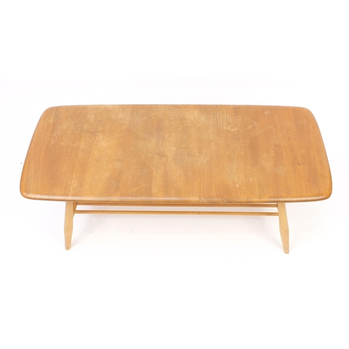 6 - Ercol light elm coffee table with magazine rack base, 36cm H x 105cm W x 46cm D