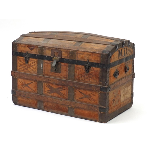 7 - Vintage dome topped leather and wooden bound travelling trunk, with His Majesty's Service labels, 54... 