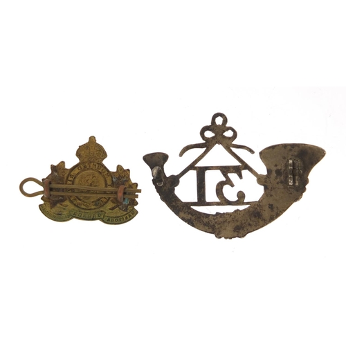 529 - Two Military interest cap badges