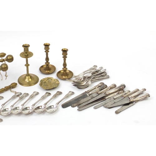 185 - Victorian brass fire tools, candlesticks and silver plated cutlery