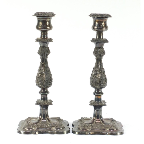 65 - Pair of Victorian style silver plated candlesticks, relief decorated with berries and flowers, 30cm ... 