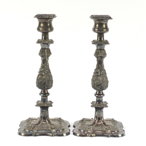 65 - Pair of Victorian style silver plated candlesticks, relief decorated with berries and flowers, 30cm ... 